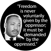 Freedom is never voluntarily given by the oppressor; it must be demanded by the oppressed--Martin Luther King, Jr. T-SHIRT