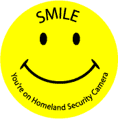 (Smiley Face) Smile You're on Homeland Security Camera--FUNNY POLITICAL BUTTON