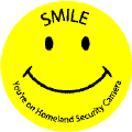 (Smiley Face) Smile You're on Homeland Security Camera--FUNNY POLITICAL BUTTON